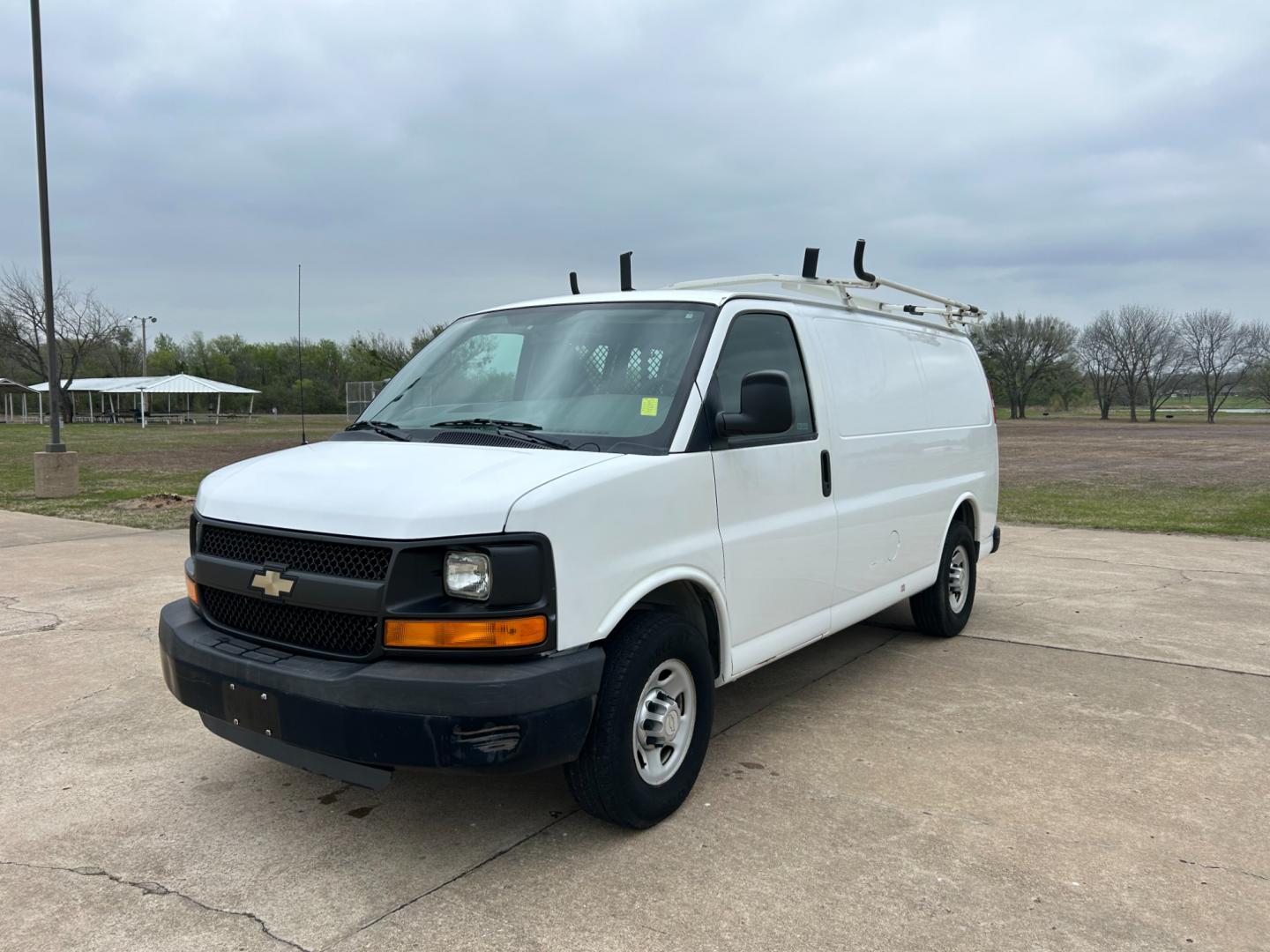 2011 White /Gray Chevrolet Express 2500 Cargo (1GCWGFCB9B1) with an 3.6L V6 DOHC 16V engine, 4-Speed Automatic transmission, located at 17760 Hwy 62, Morris, OK, 74445, (918) 733-4887, 35.609104, -95.877060 - Photo#0